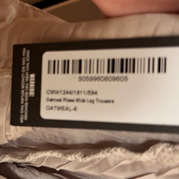 PrettyLittlething Oatmeal Plisse wide leg pants size 2 Dressy classy evening out - Picture 9 of 10